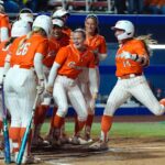 Oklahoma State Cowgirls infielder Karli Godwin (14) celebrates after hitting a home run in the third inning of a Bedlam softball game between the Oklahoma State Cowgirls and the Oklahoma Sooners at Devon Park in Oklahoma CIty, Wednesday, April 15, 2026. Oklahoma State won 6-4.