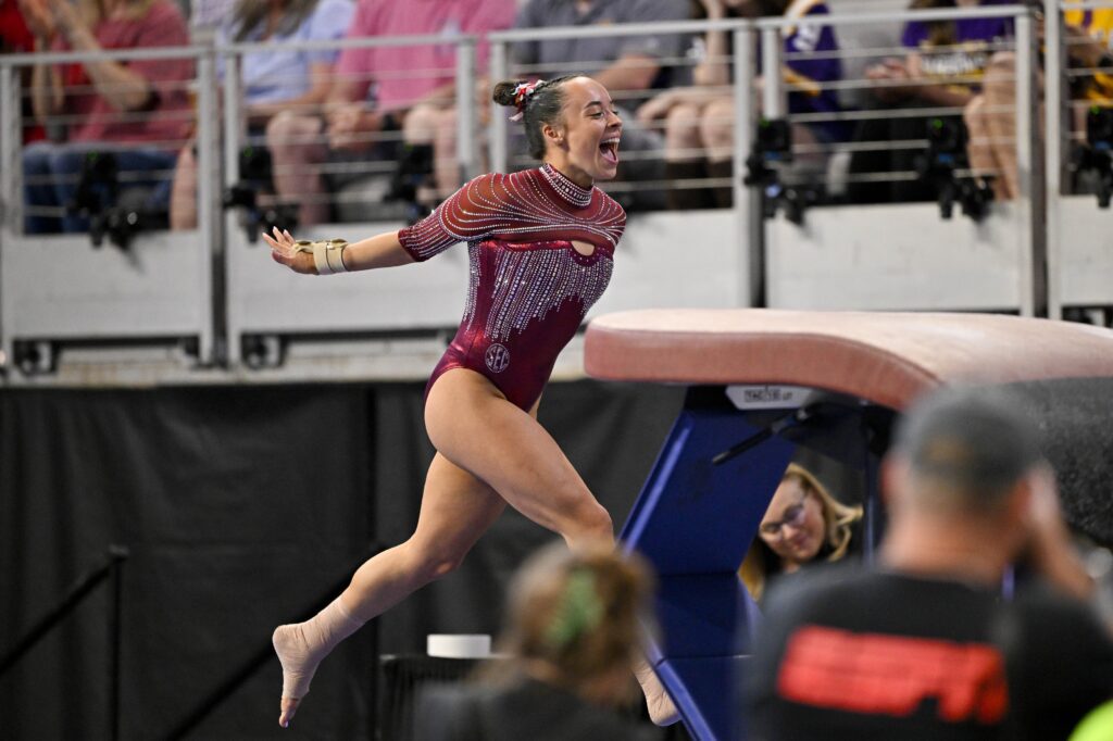 University of Oklahoma gymnast Faith Torrez celebrates after performing on vault during semifinals for the 2026 NCAA Women’s Gymnastics National Championships at Dickies Arena.