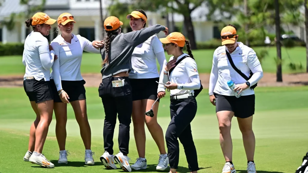 Tennessee women's golf team including coach Diana Cantú on the green at the SEC women's golf championship 2026.