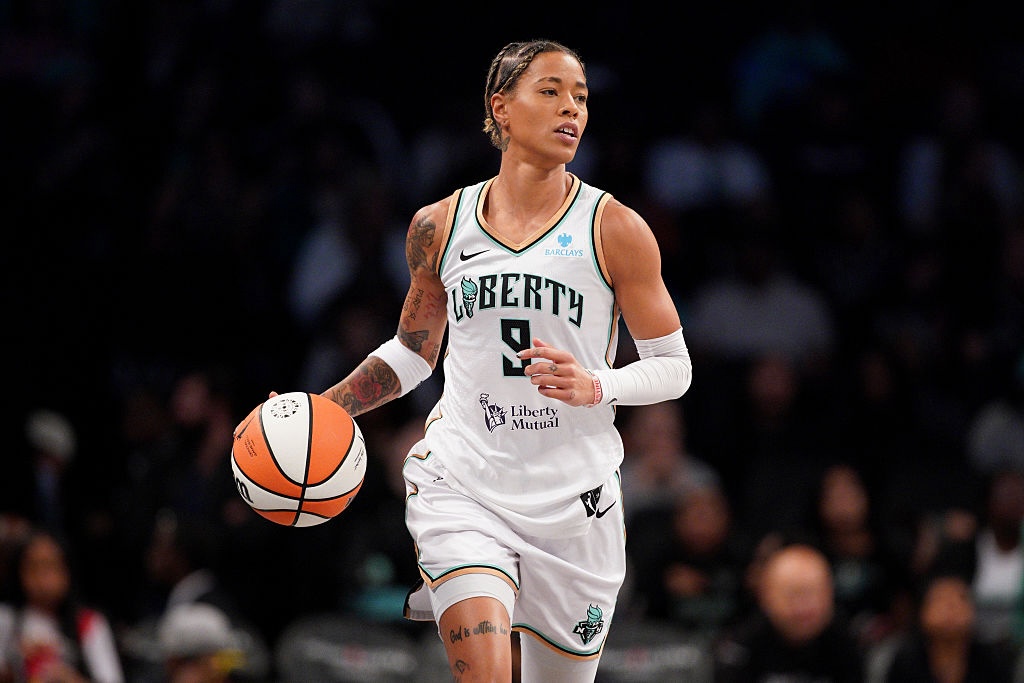Chicago Sky signing Natasha Cloud #9 of the New York Liberty dribbles the ball against the Chicago Sky during the first half at Barclays Center on August 21, 2025 in New York City.