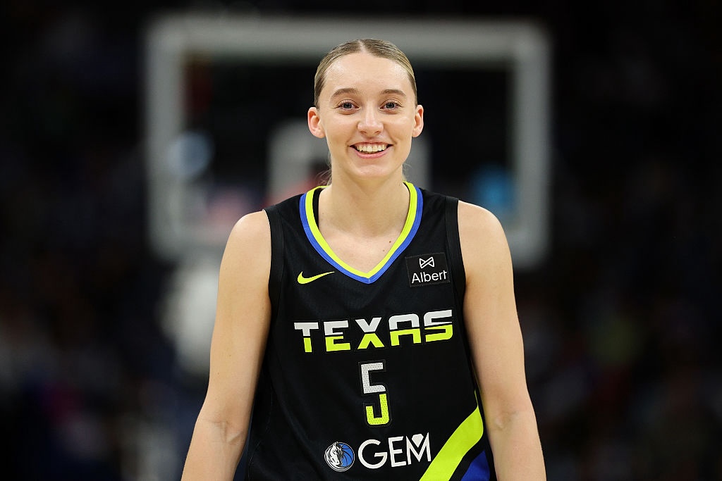 WNBA GM survey frontrunner Paige Bueckers #5 of the Dallas Wings smiles in the first quarter against the Minnesota Lynx at Target Center on September 01, 2025 in Minneapolis, Minnesota.