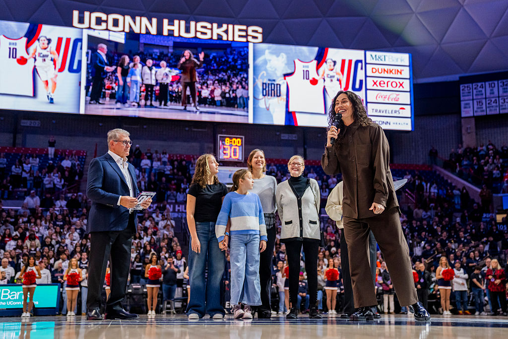 Former Connecticut Husky Sue Bird speaks during her jersey retirement ceremony before an NCAA women’s basketball game against the DePaul Blue Demons at Harry A. Gampel Pavilion on December 07, 2025 in Storrs, Connecticut.