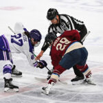 PWHL playoffs Linesman drops the puck at a face-off between Minnesota Frost forward Taylor Heise (27) and Montreal Victoire forward Marie-Philip Poulin (29) during game one of the Walter Cup Playoffs between the Minnesota Frost and the Montreal Victoire on May 02, 2026, at Place Bell in Laval, QC