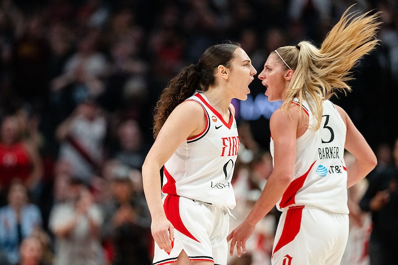 Guards Carla Leite #0 and Sarah Ashlee Barker #3 of the Portland Fire react after a successful three point basket was made during the first half of the game against the New York Liberty at Moda Center on May 12, 2026 in Portland, Oregon.