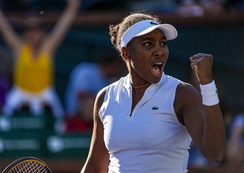 Venus Williams reacts to winning the second set