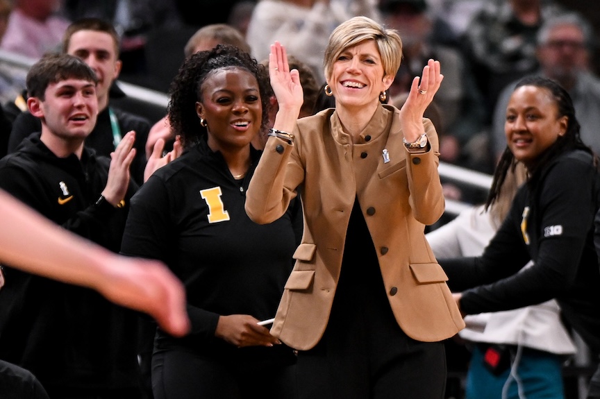 Iowa Hawkeyes head coach Jan Jensen claps her hands against the Michigan Wolverines during the second half at Gainbridge Fieldhouse ahead of series with Uconn women's basketball.