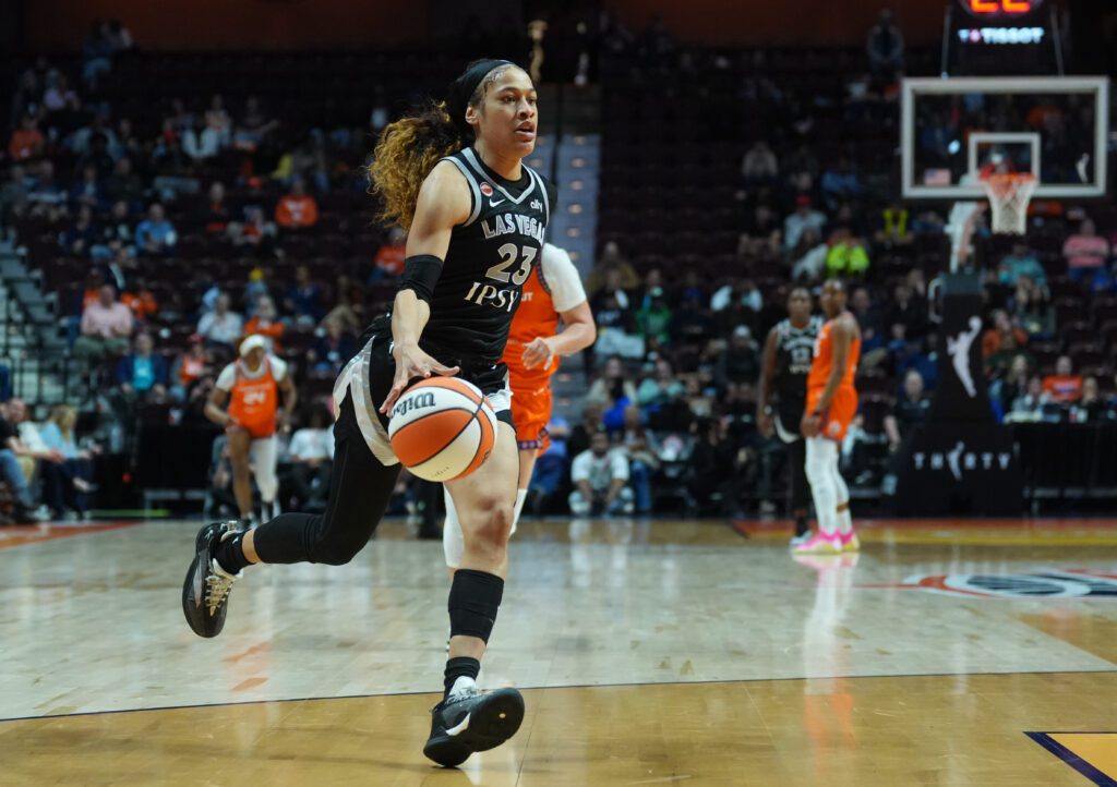 Las Vegas Aces guard Chennedy Carter (23) drives to the basket against the Connecticut Sun
