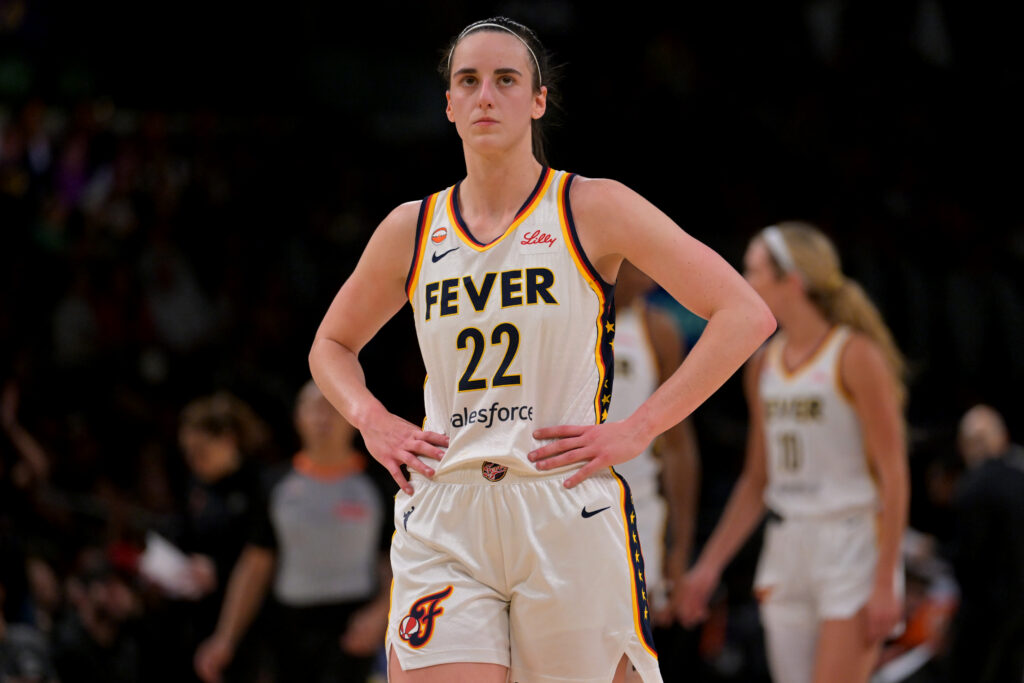 Indiana Fever guard Caitlin Clark (22) looks on in the second half against the Los Angeles Sparks at Crypto.com Arena.