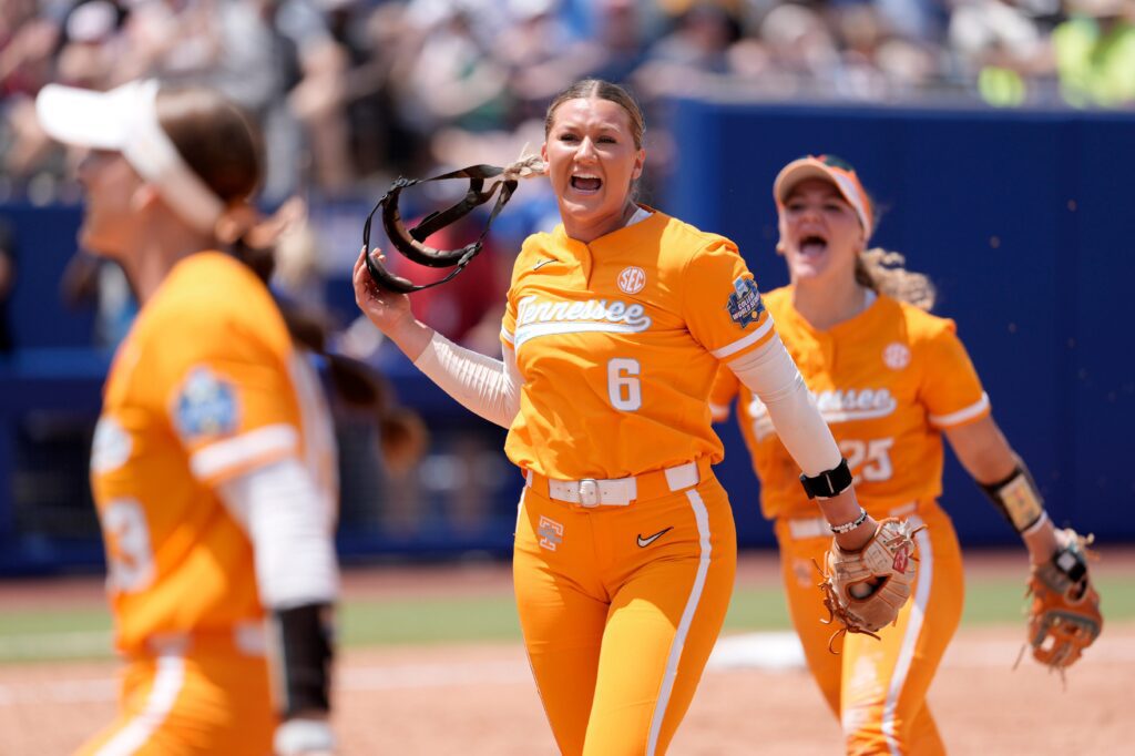 Tennessee Lady Volunteers pitcher Sage Mardjetko (6) celebrates after an inning during a Women's College World Series softball game between the Tennessee Volunteers and the Texas Longhorns at Devon Park in Oklahoma City.