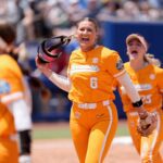 Tennessee Lady Volunteers pitcher Sage Mardjetko (6) celebrates after an inning during a Women's College World Series softball game between the Tennessee Volunteers and the Texas Longhorns at Devon Park in Oklahoma City.