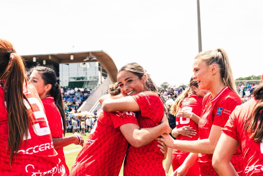 Simply Futbol FC celebrates their win against the US Women in the semifinal of TST.