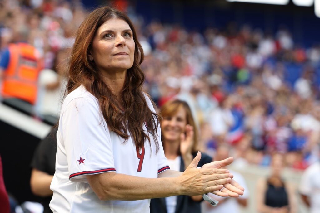 Mia Hamm waves as the 1999 United States FIFA Women’s World Cup Team are honored before the game between the United States and Mexico in an international friendly at Red Bull Arena.