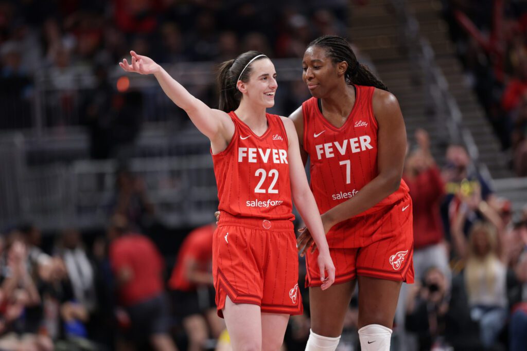 Aliyah Boston #7 and Caitlin Clark #22 of the Indiana Fever looks on during the game against the Chicago Sky during a WNBA game on May 17, 2025 at Gainbridge Fieldhouse in Indianapolis, Indiana.