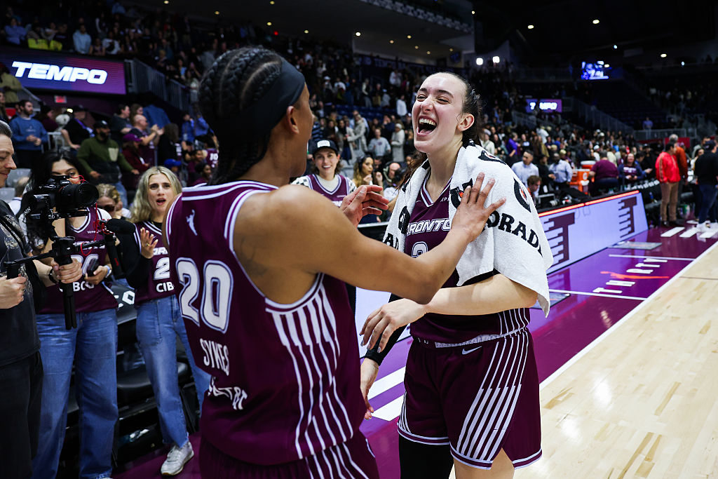 Marina Mabrey #3 of the Toronto Tempo celebrates with teammate Brittney Sykes #20 after defeating the Seattle Storm 86-73 at Coca-Cola Coliseum on May 13, 2026 in Toronto, Ontario, Canada ahead of Friday's Tempo vs Mystics WNBA Commissioner's Cup match.