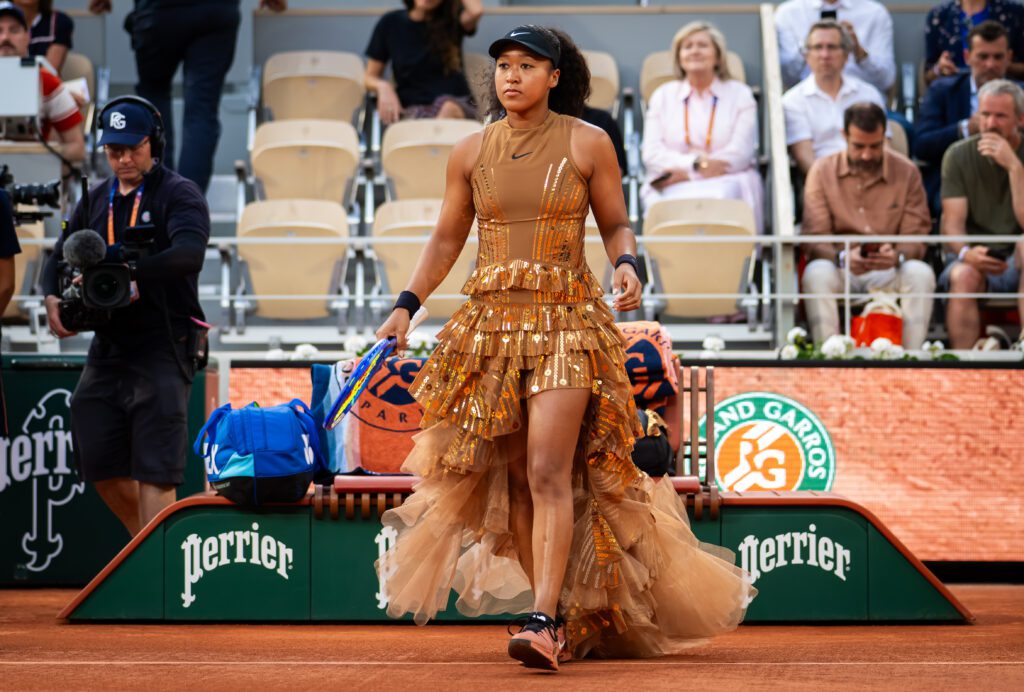 Naomi Osaka of Japan walks onto the court to play against Aryna Sabalenka in the fourth round on Day Nine of the 2026 French Open at Roland Garros.