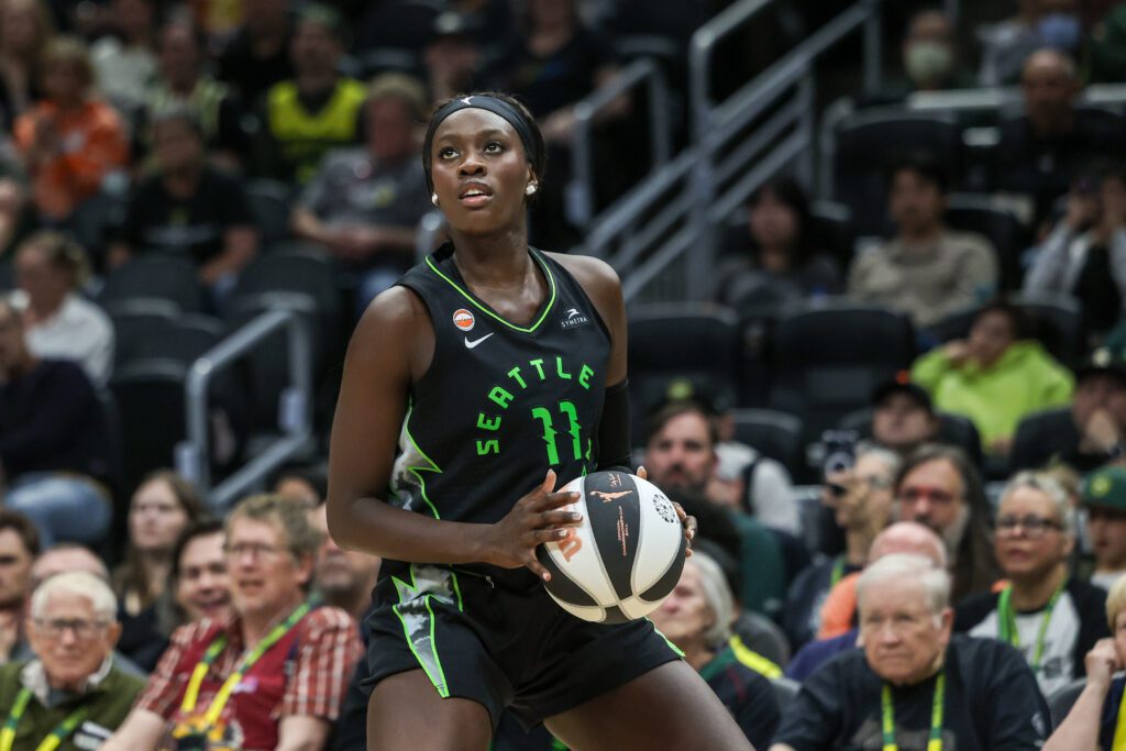 Awa Fam #11 of the Seattle Storm eyes a three-pointer during the third quarter against the Phoenix Mercury at Climate Pledge Arena on June 03, 2026 in Seattle, Washington.