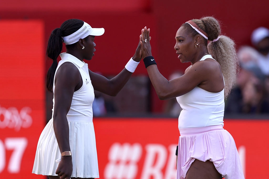 Serena Williams of the United States and Victoria Mboko of Canada celebrate a point against Nicole Melichar-Martinez of the United States and Erin Routliffe of New Zealand during the Women's Doubles first round match on Day Two of the HSBC Championships at The Queen's Club on June 09, 2026 in London, England.