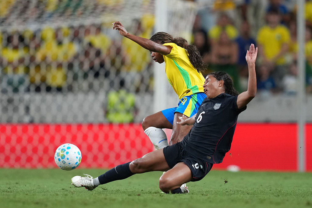 Ludmila of Brazil competes for the ball with Kennedy Wesley of United States during the international friendly match between Brazil and United States at Arena Castelão on June 09, 2026 in Fortaleza, Brazil.