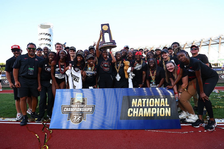The Georgia Bulldogs celebrate with the NCAA Trophy after being crowned women's team champions during the Division I Men’s and Women’s Track and Field Championship held at Hayward Field on June 13, 2026 in Eugene, Oregon.