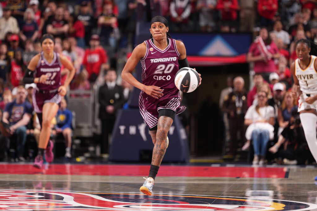 Brittney Sykes #20 of the Toronto Tempo handles the ball during the game against the Indiana Fever.
