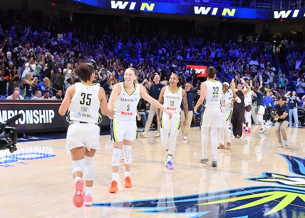 The Dallas Wings celebrate after the game against the Chicago Sky on June 20, 2026 at the College Park Center in Arlington, TX in the Wings vs Sky matchup.