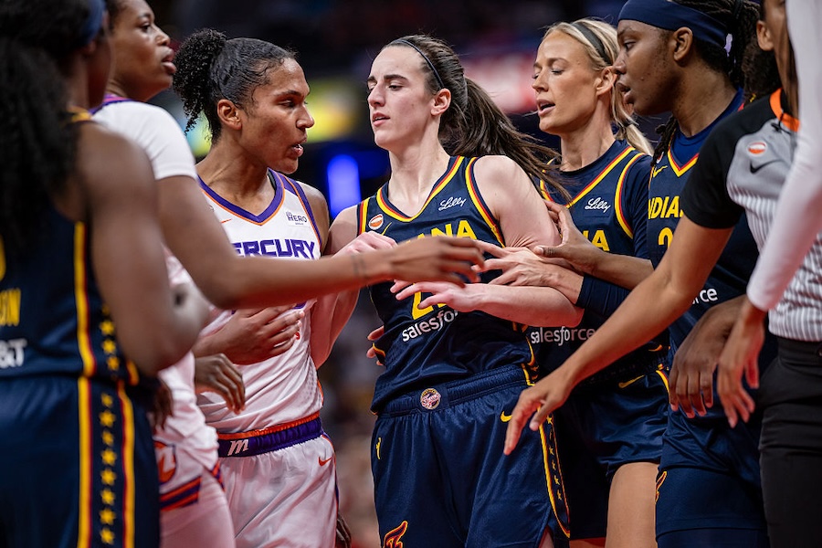 Alyssa Thomas #25 of the Phoenix Mercury and Caitlin Clark #22 of the Indiana Fever get into a scuffle during the game at Gainbridge Fieldhouse on June 22, 2026 in Indianapolis, Indiana in the Fever vs Mercury WNBA game.