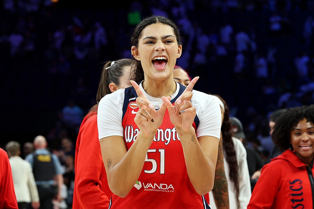 Lauren Betts #51 of the Washington Mystics celebrates the win against the Minnesota Lynx after the game at Target Center on June 21, 2026 in Minneapolis, Minnesota. The Mystics defeated the Lynx 84-79.