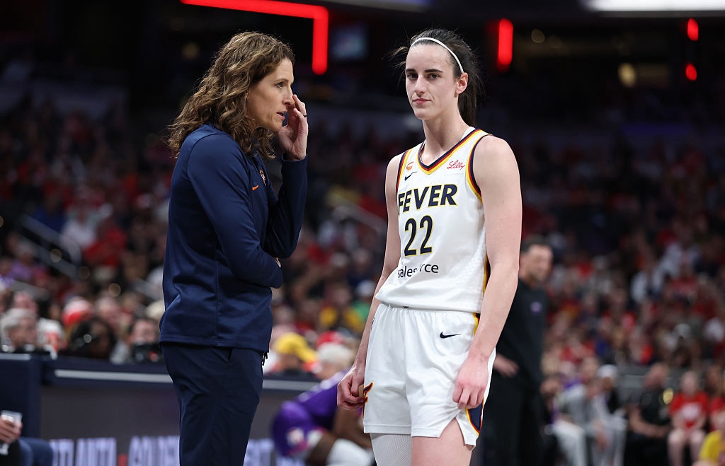 Caitlin Clark #22 of the Indiana Fever talks with Head Coach Stephanie White during the game against the Phoenix Mercury at Gainbridge Fieldhouse on June 24, 2026 in Indianapolis, Indiana ahead of Saturday's Fever vs Sparks game without star Kelsey Plum.