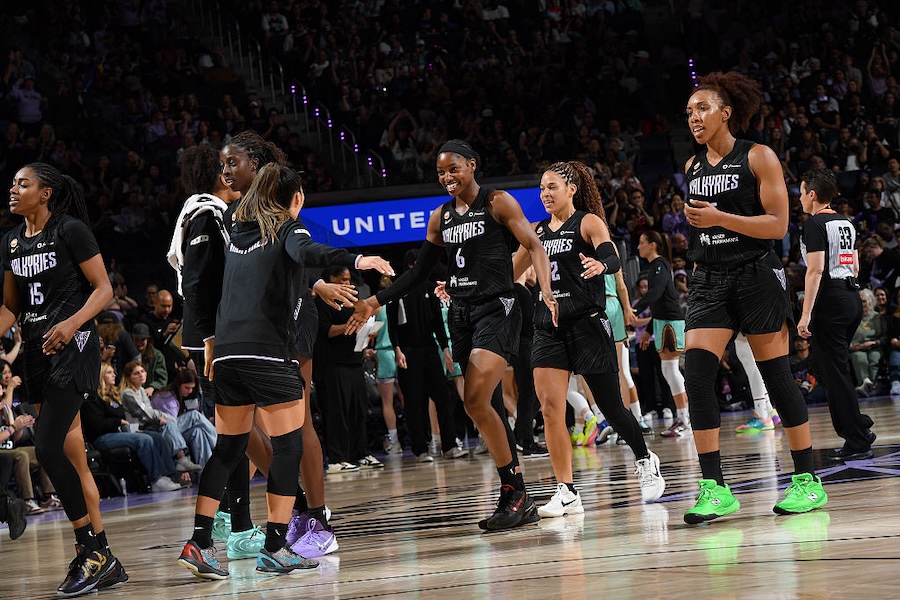 Kaila Charles #6, Veronica Burton #22, Kayla Thornton #5, Laeticia Amihere #3, Kaitlyn Chen #2, and Tiffany Hayes #15 of the Golden State Valkyries high five during the game against the New York Liberty on June 28, 2026 at Chase Center in San Francisco, California.