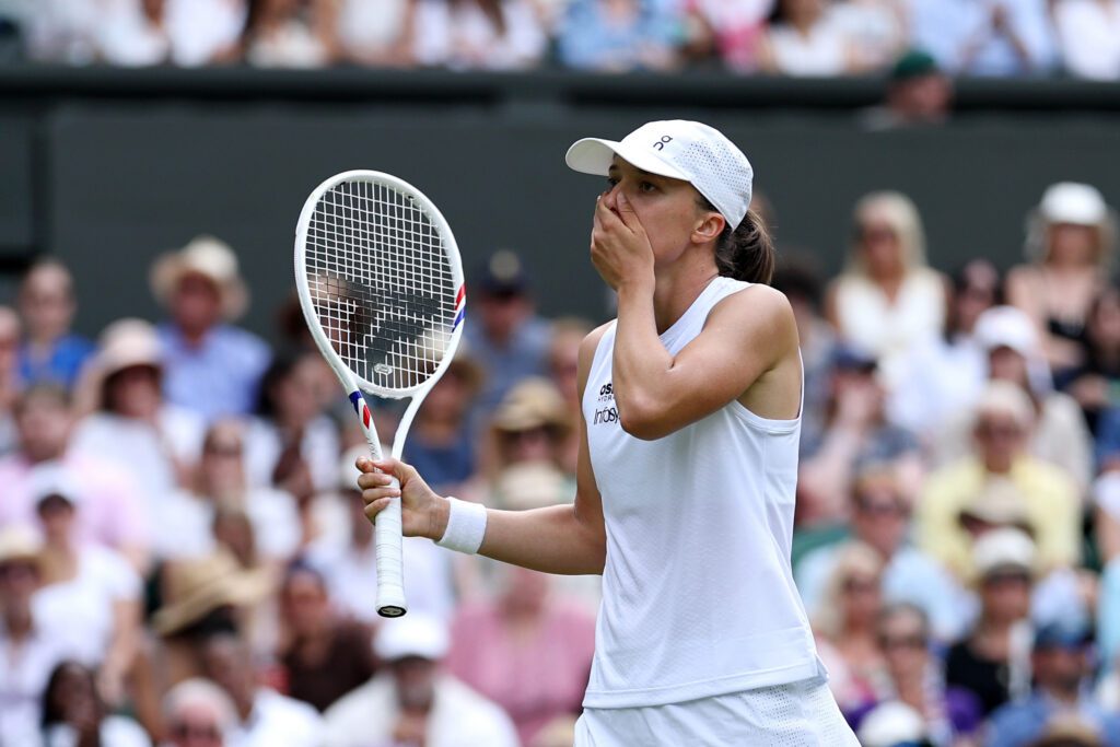 Iga Swiatek of Poland reacts against Taylor Townsend of United States during their Ladies' Singles first round match on day two of The Championships Wimbledon 2026.