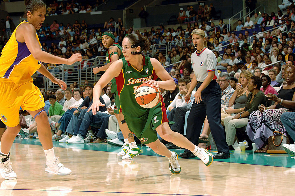 Sue Bird #10 the Seattle Storm drives past Christie Thomas #32 of the Los Angeles Sparks on July 16, 2005 at Staples Center, in Los Angeles, California wearing her signature Nike sneakers.