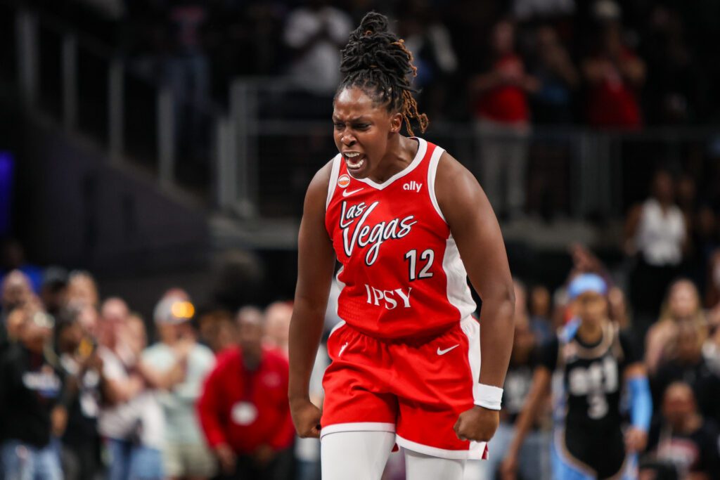 Las Vegas Aces guard Chelsea Gray (12) reacts after making a go-ahead basket.