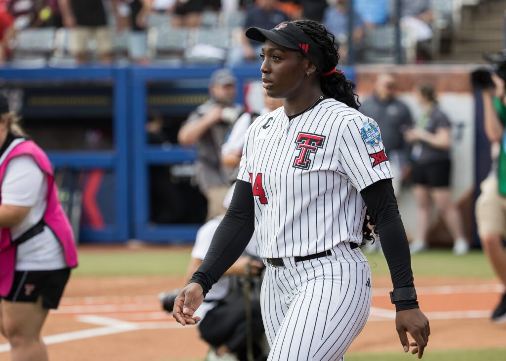 Texas Tech Red Raiders pitcher Nijaree Canady (24) walks onto the field during introductions before the game against the Mississippi State Bulldogs during the NCAA Women’s College World Series.
