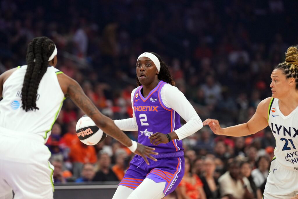 Phoenix Mercury guard-forward Kahleah Copper (2) dribbles against the Minnesota Lynx during the first half at Mortgage Matchup Center ahead of the Mercury vs Storm WNBA Commissioner's Cup game.
