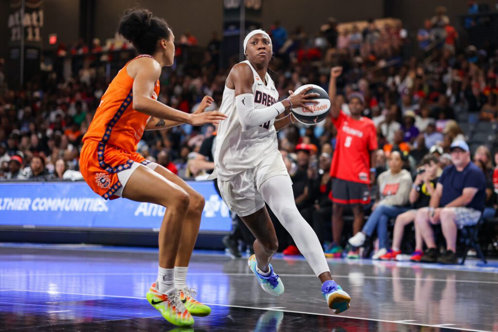 Atlanta Dream guard Rhyne Howard (10) drives to the basket against the Connecticut Sun.
