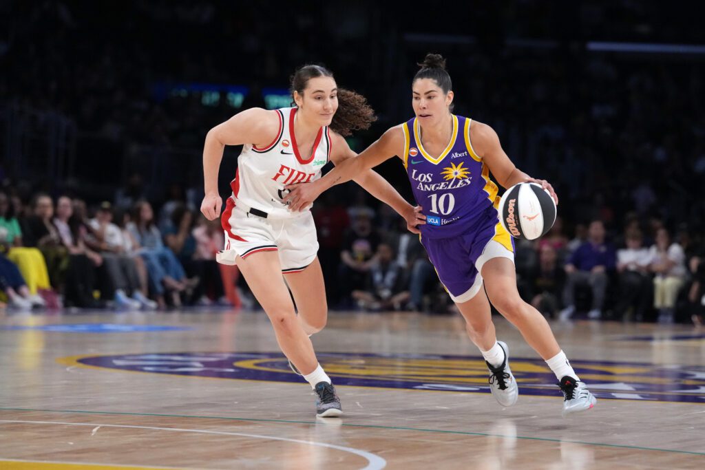 LA Sparks guard Kelsey Plum (10) dribbles against Portland Fire guard Carla Leite (0) in the second half at Crypto.com Arena.