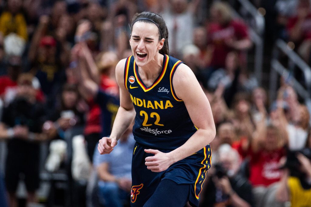 Indiana Fever guard Caitlin Clark (22) celebrates a made basket in the first half against the Chicago Sky at Gainbridge Fieldhouse.