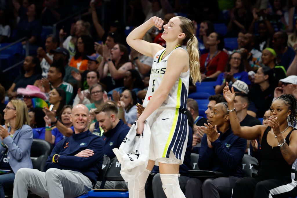 Dallas Wings guard Paige Bueckers (5) celebrates after a play against the Phoenix Mercury during the second half at College Park Center.