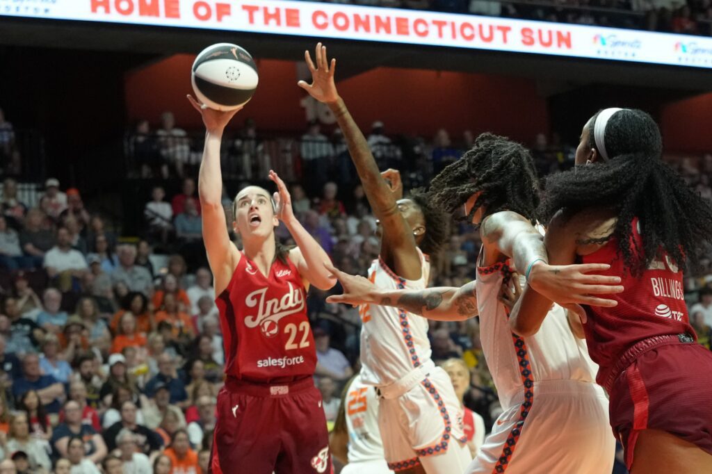 Indiana Fever guard Caitlin Clark (22) shoots a jump shot against the Connecticut Sun during the second half at Mohegan Sun Arena ahead of the Fever vs Tempo WNBA game.