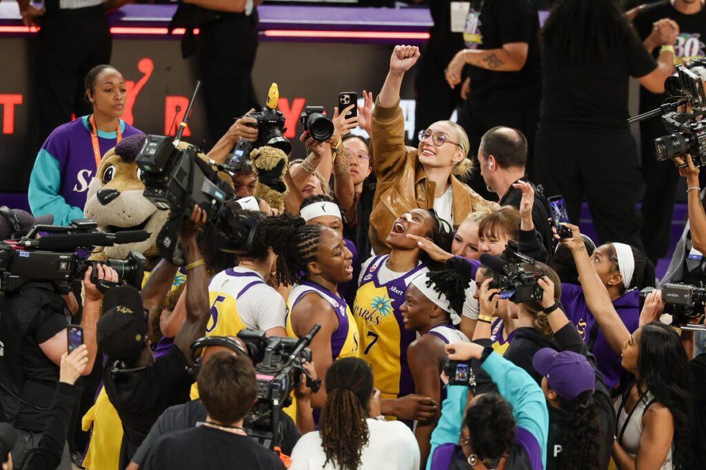 LA Sparks forward Nneka Ogwumike (30) celebrates game winning buzzer beating three point shot with teammates against the New York Liberty at Crypto.com Arena during the liberty vs sparks game.