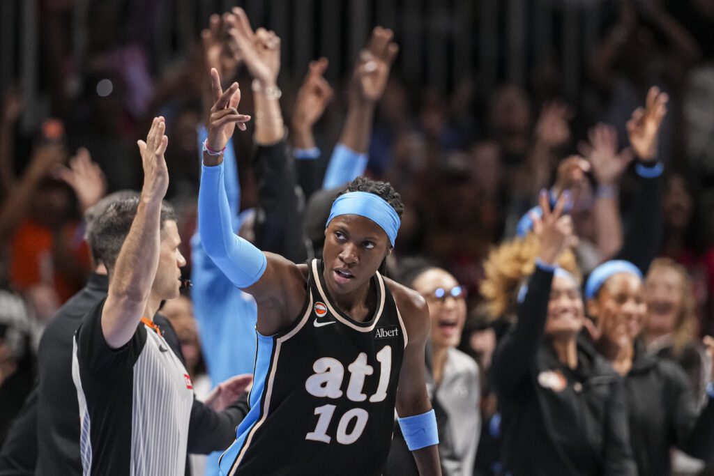 Atlanta Dream guard Rhyne Howard (10) reacts with the fans after making a three point shot against the Toronto Tempo during the second half at State Farm Arena.