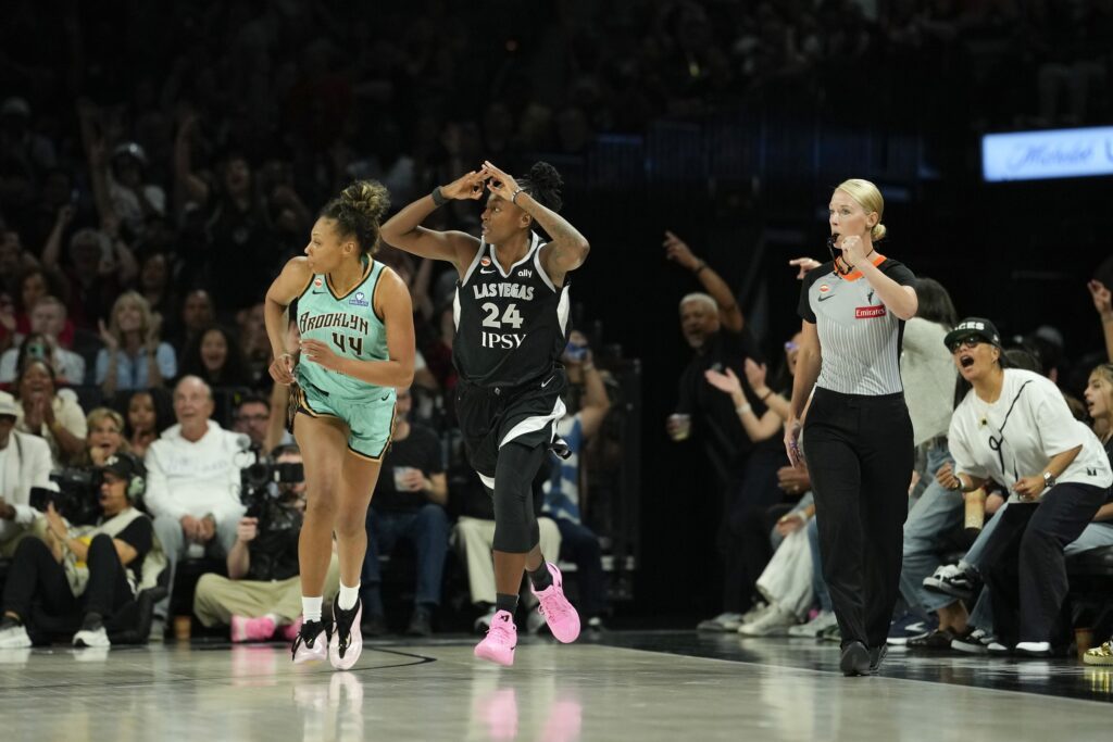 Las Vegas Aces guard Jewell Loyd (24) celebrates after scoring against the New York Liberty during the third quarter of a WNBA basketball game at Michelob Ultra Arena ahead of the 2026 WNBA Commissioner's Cup.