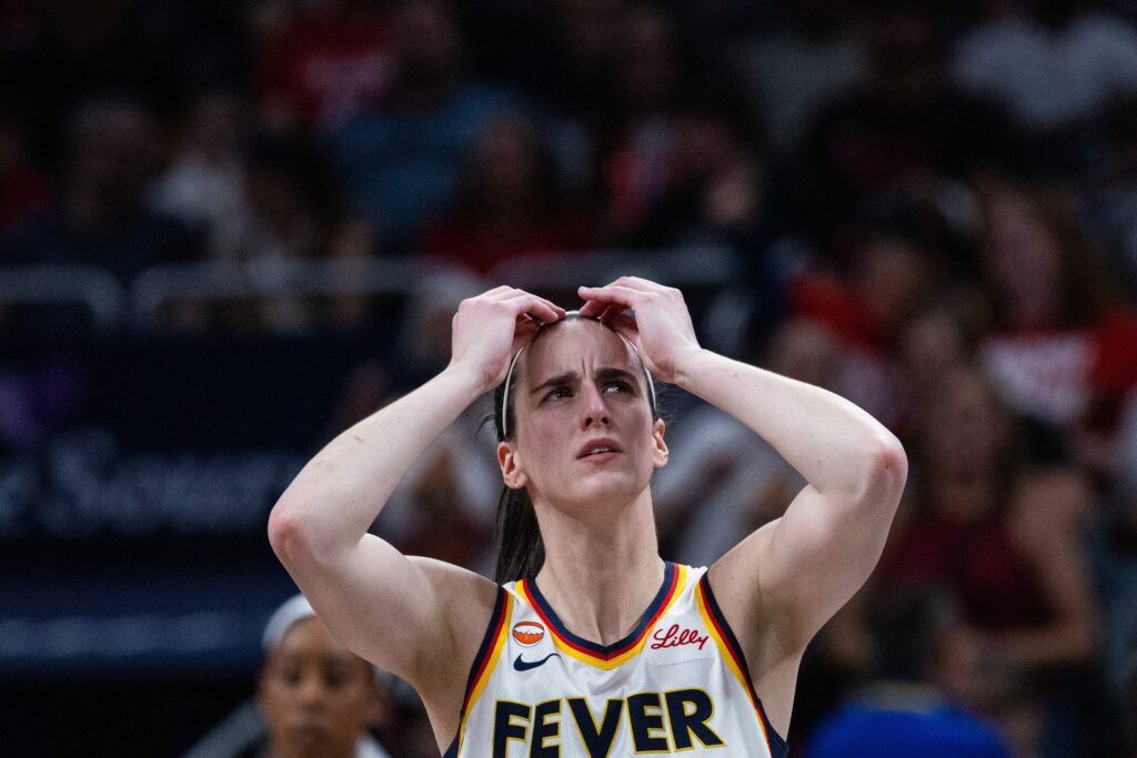 Indiana Fever guard Caitlin Clark (22) reacts in the first half against the Phoenix Mercury at Gainbridge Fieldhouse.