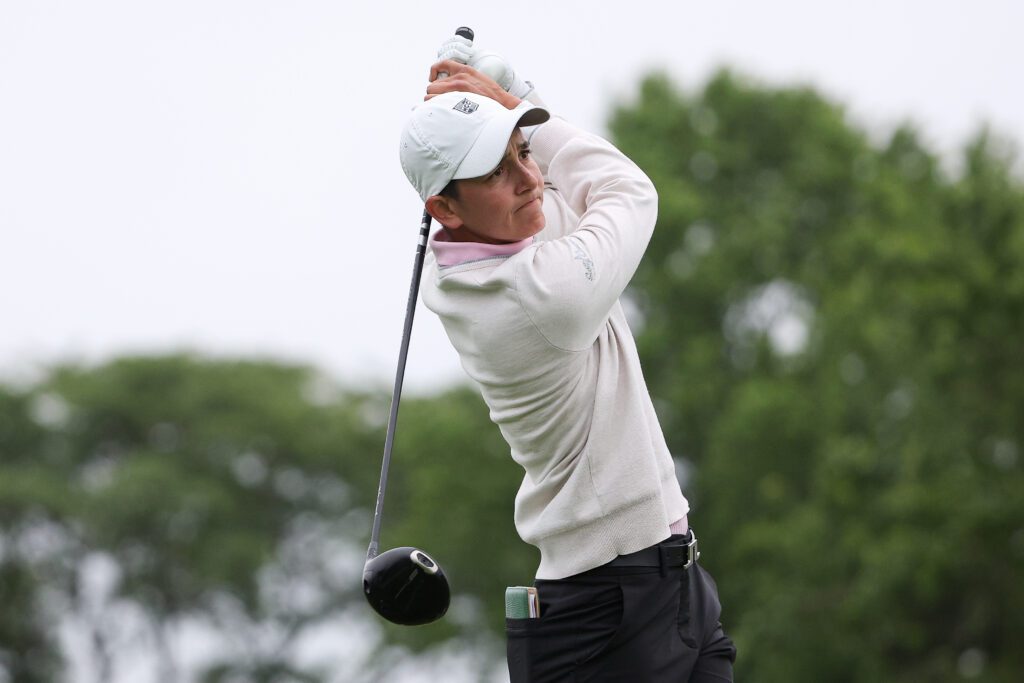 Dewi Weber hits her tee shot on the third hole during the first round of the KPMG Women's PGA Championship golf tournament.