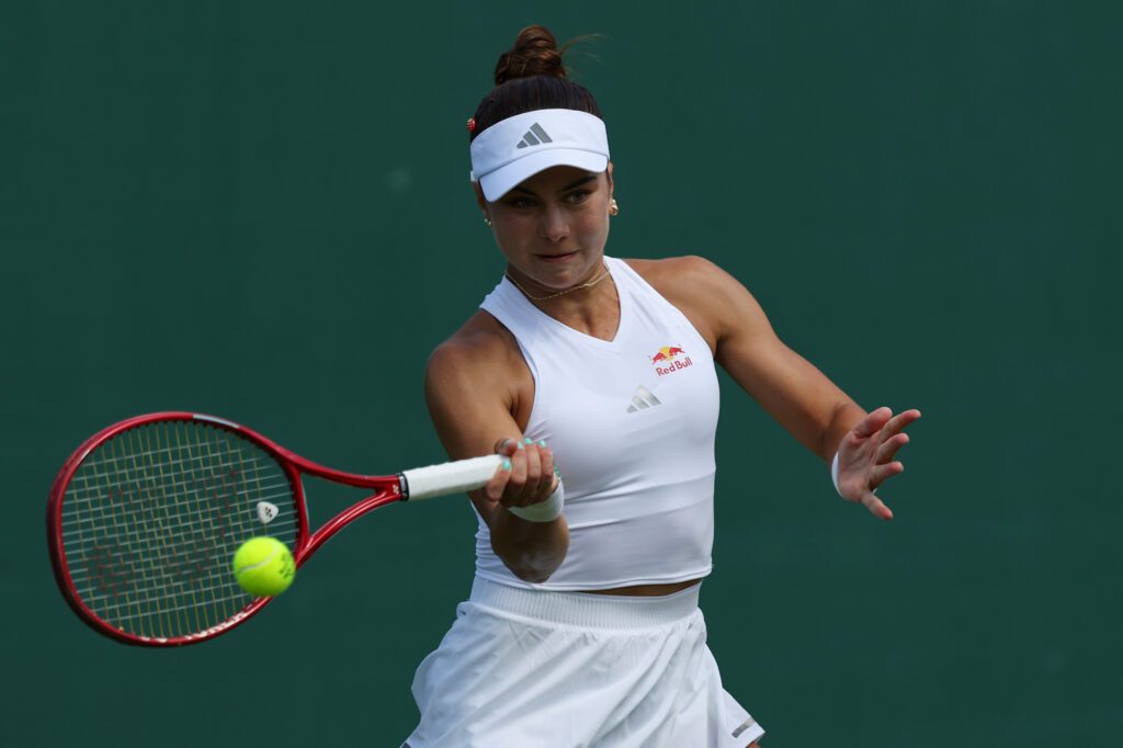 Iva Jovic (USA) hits a forehand against Jaqueline Cristian (ROU) (not pictured) on day one of The Championships Wimbledon 2026 at All England Lawn Tennis and Croquet Club.