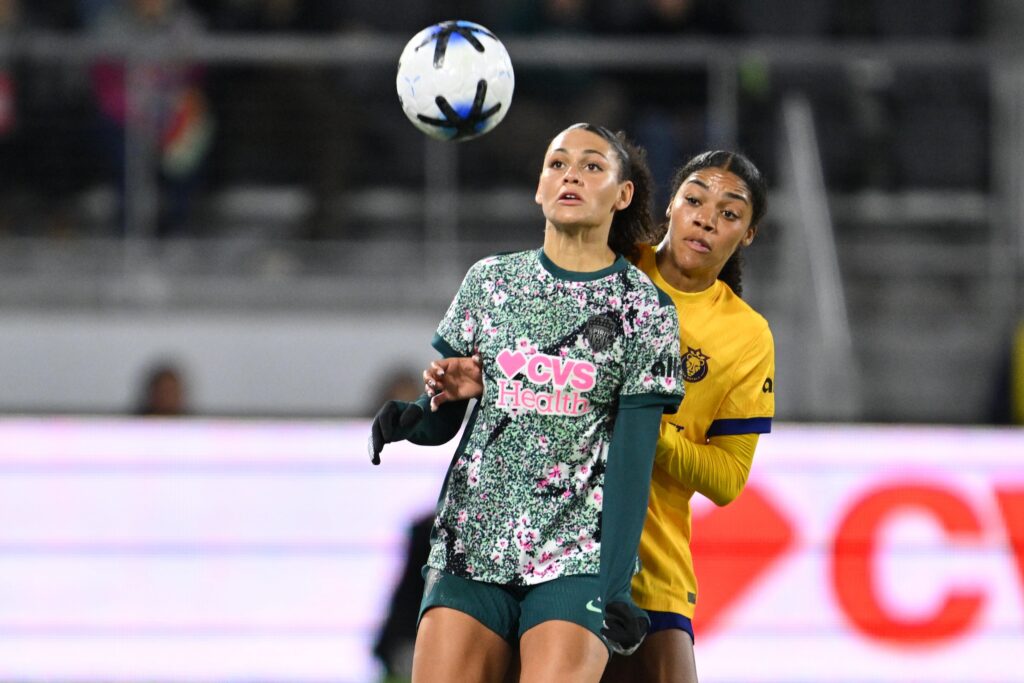 Washington Spirit forward Trinity Rodman (2) takes control of the ball in front of Utah Royals defender Kameron Simmonds (6) in the first half at Audi Field.