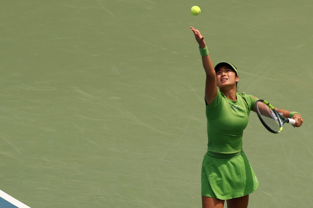 Alexandra Eala (PHI) serves against Qinwen Zheng (CHN) (not pictured) on day two of the 2026 Mubadala DC Open.