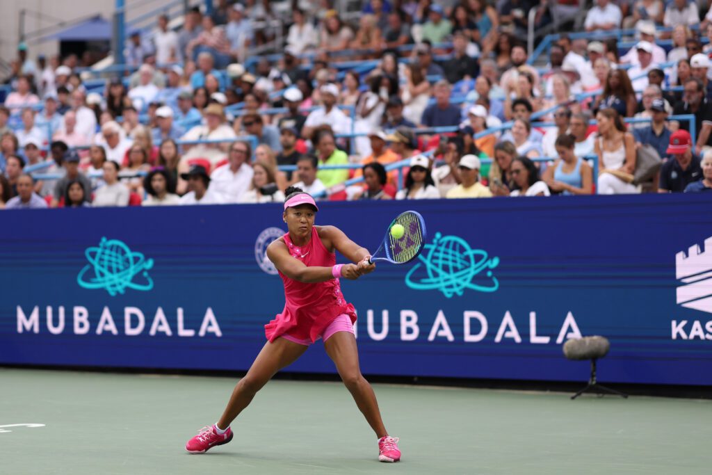 Naomi Osaka (JPN) hits a backhand against Ashlyn Krueger (USA) (not pictured) on day three of the 2026 Mubadala DC Open.