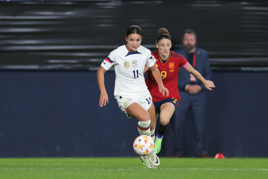 Sophia Smith #11 of the United States is marked by Esther Gonzale #9 of Spain during a game between Spain and USWNT at El Sadar Stadium on October 11, 2022 in Pamplona, Spain.