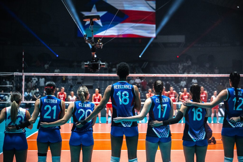 Puerto Rico's team stands for the national anthems before the Volleyball World Cup 2023 women's match between Turkey and Puerto Rico in Tokyo on September 16, 2023.